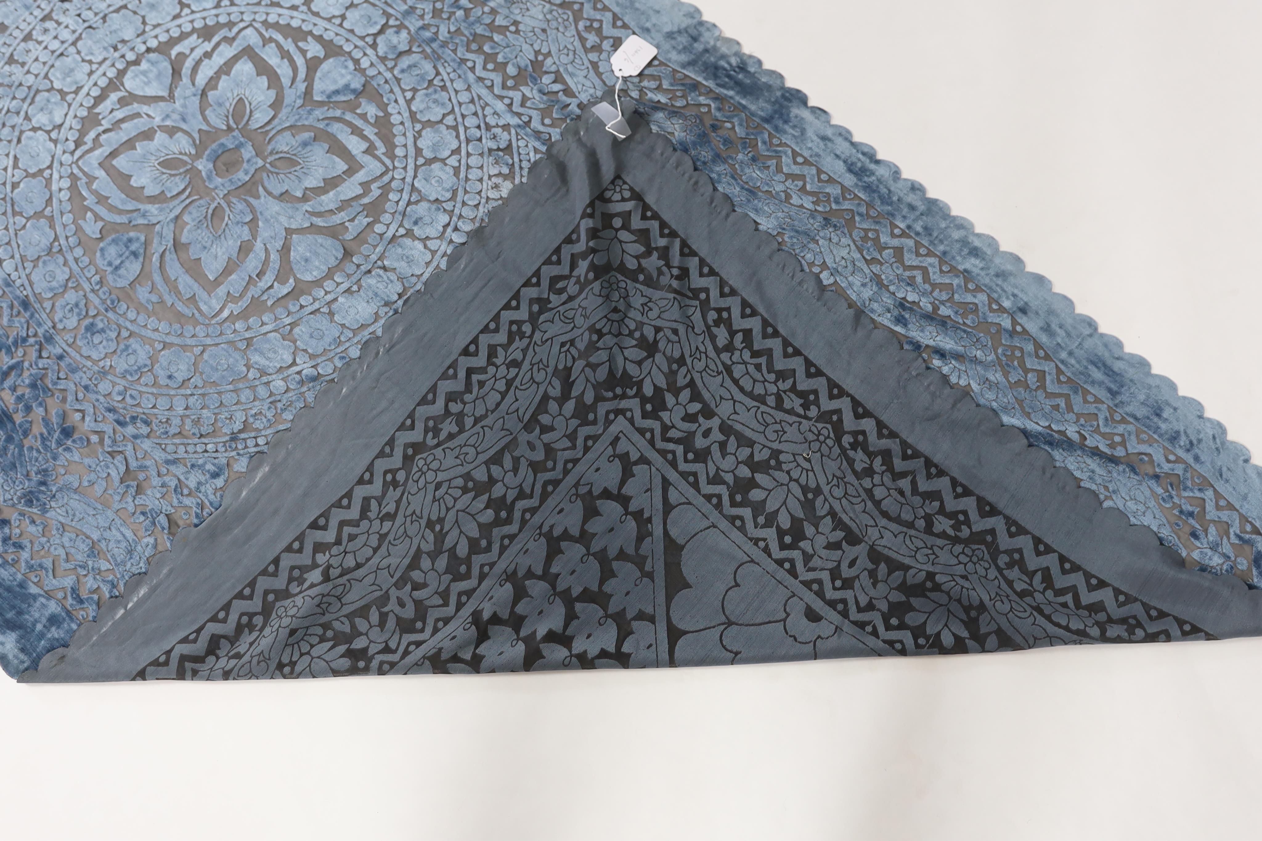 A 20th century blue and black patterned silk cut velvet evening stole with scalloped borders, 102cm wide x 224cm long